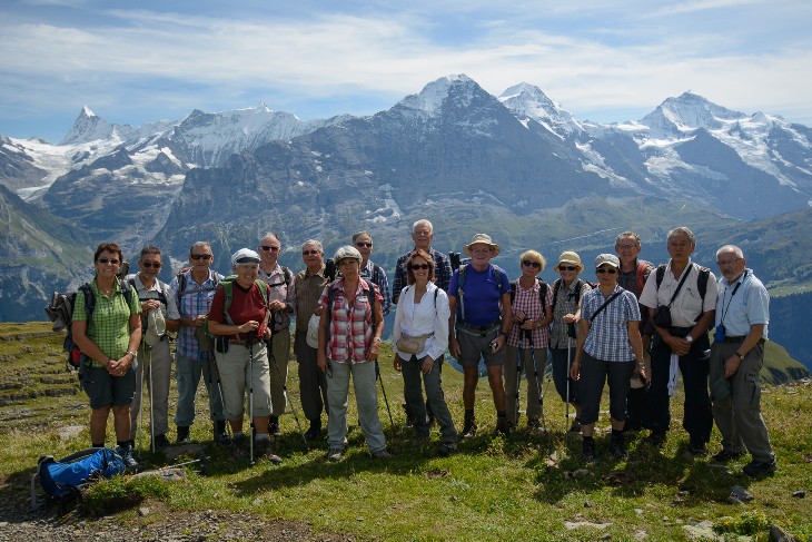 the group in front of the major peaks of the Bernese Oberland, Finsteraarhorn, Eiger, Mönch and Jungfrau